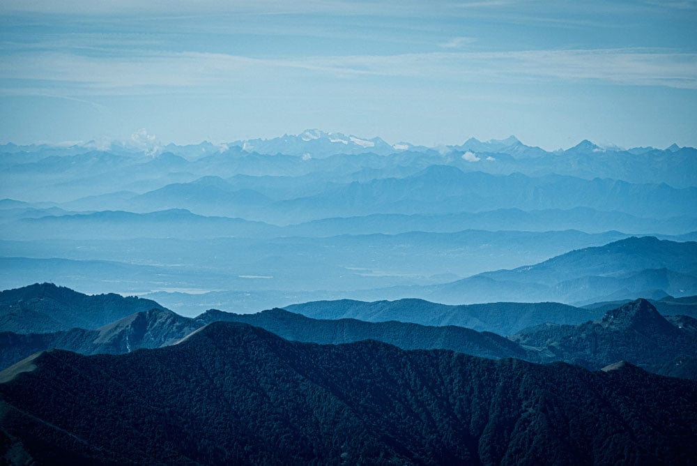Home Decoration Featuring a Wallpaper Mural of Foggy Rocky Mountains