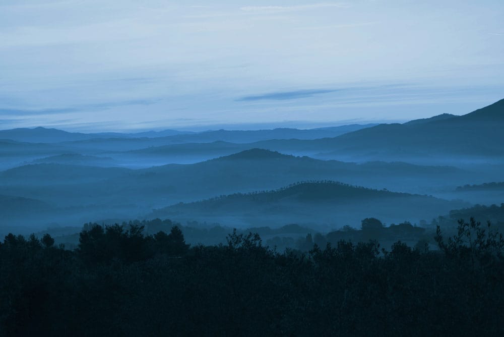 Wallpaper Mural in Ombre Blue with Hilltops for Home Decoration