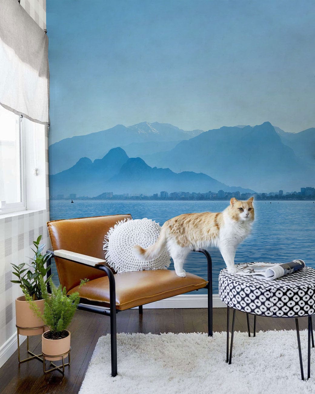 Wallpaper mural featuring a lake and mountains in blue for use in decorating the hallway