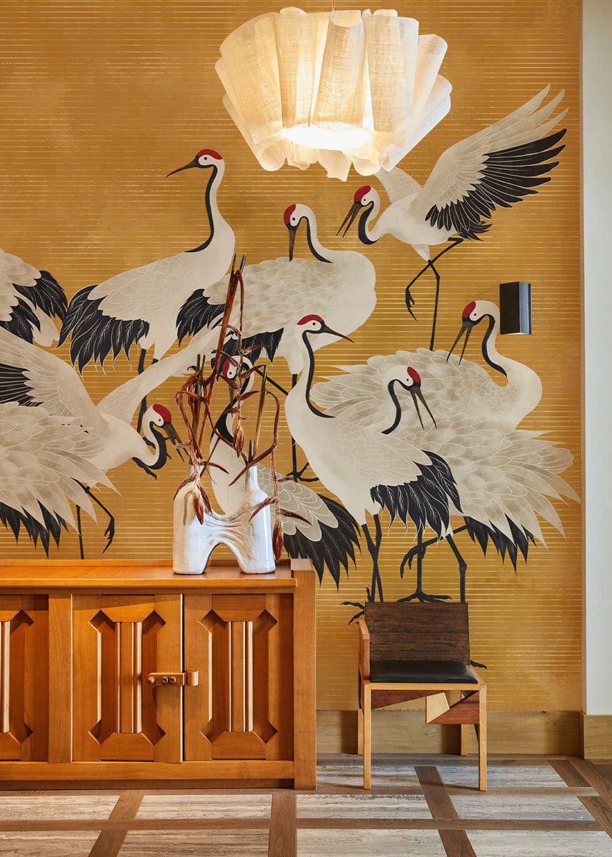 Decorate Your Hallway with This Mural of Cranes on Yellow Wallpaper