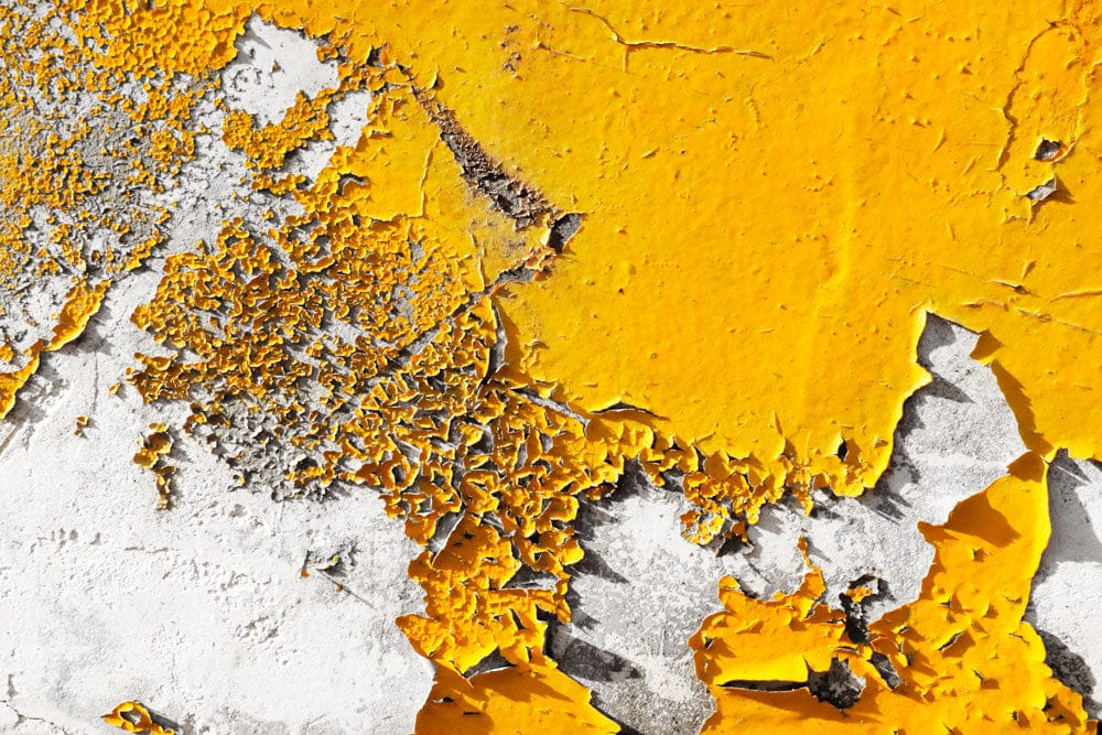 Mural wallpaper featuring dry yellow paint for use as room decoration
