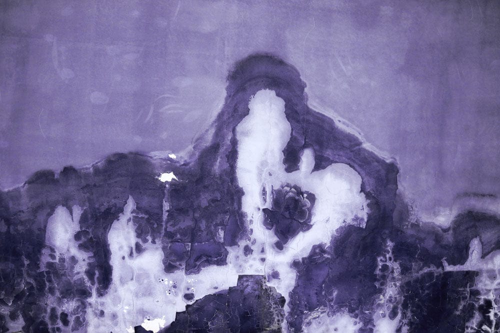 Wallpaper mural for room decoration featuring a melting purple and white marble design.