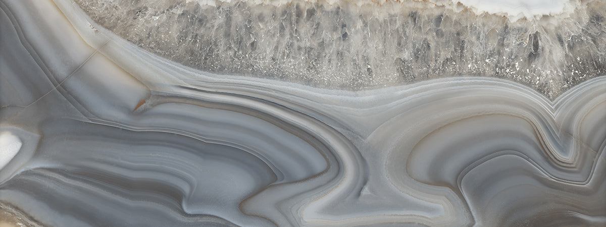 Wallpaper mural with a rippled grey marble pattern. Plain