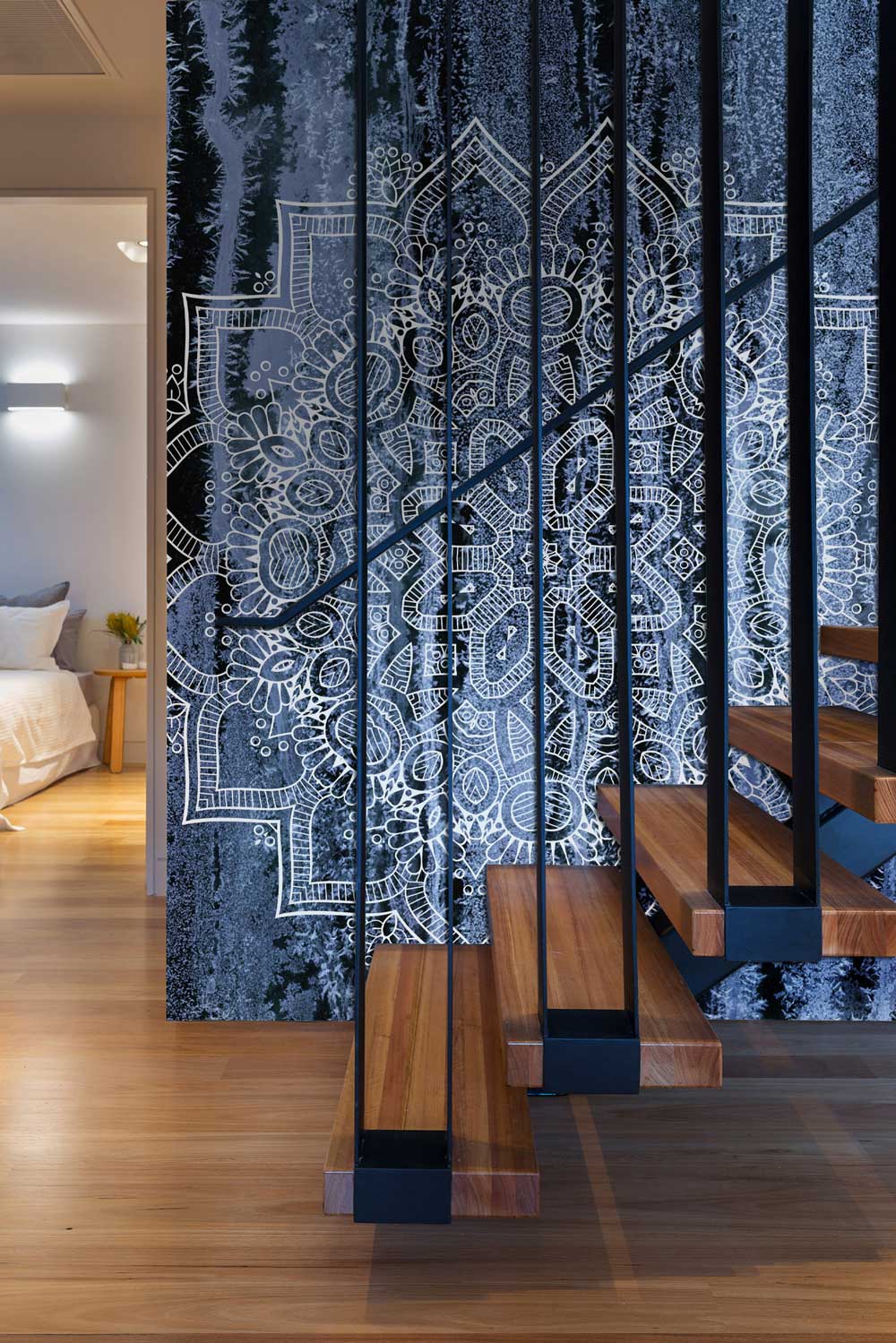 Hallway wall paintings with a white Mandala design and snow crystals