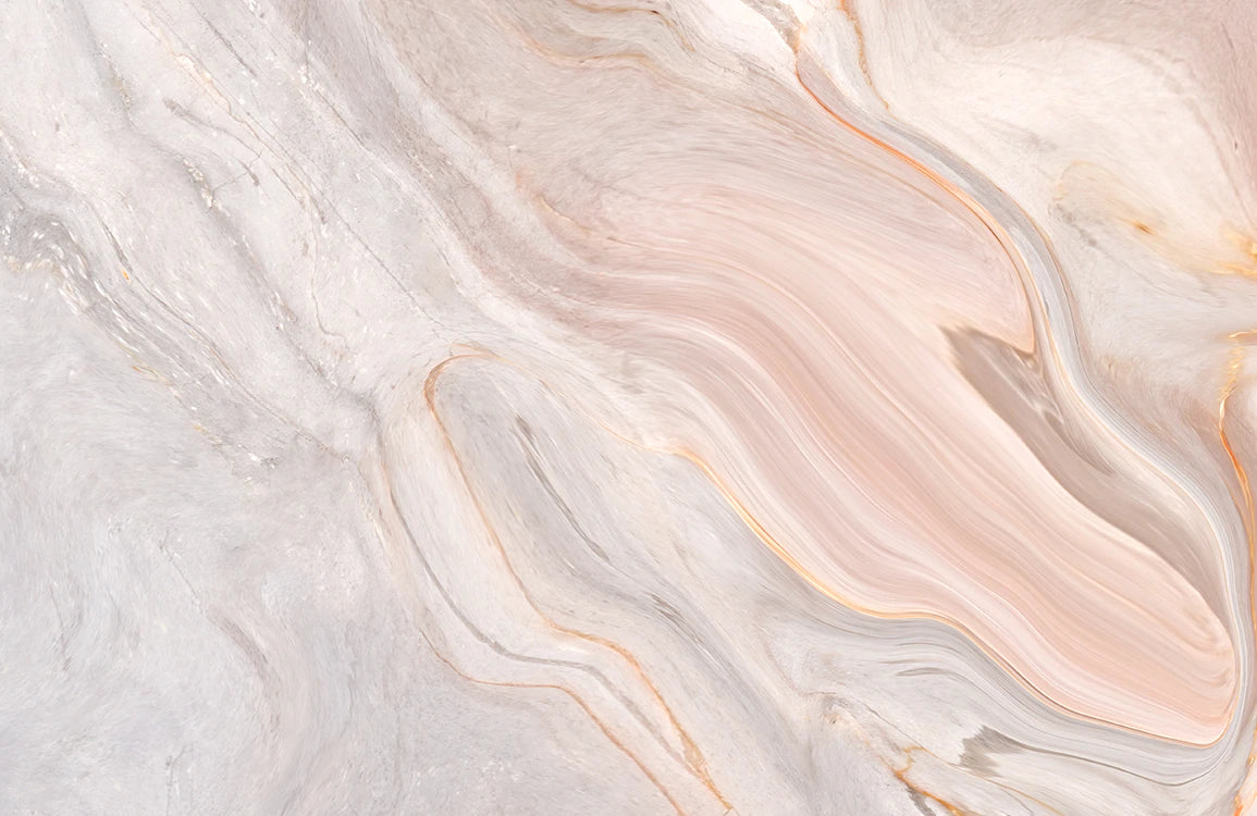 Wallpaper mural for the home decorated in a pastel pink marble pattern.