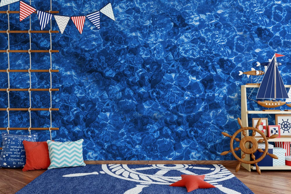Wallpaper mural with blue ripples for use as a decoration in a nursery.
