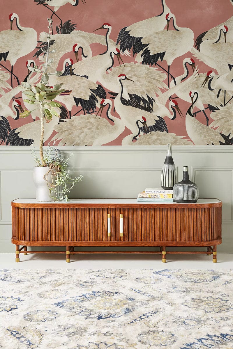 Wallpaper mural featuring cranes on a pink background, perfect for the hallway.