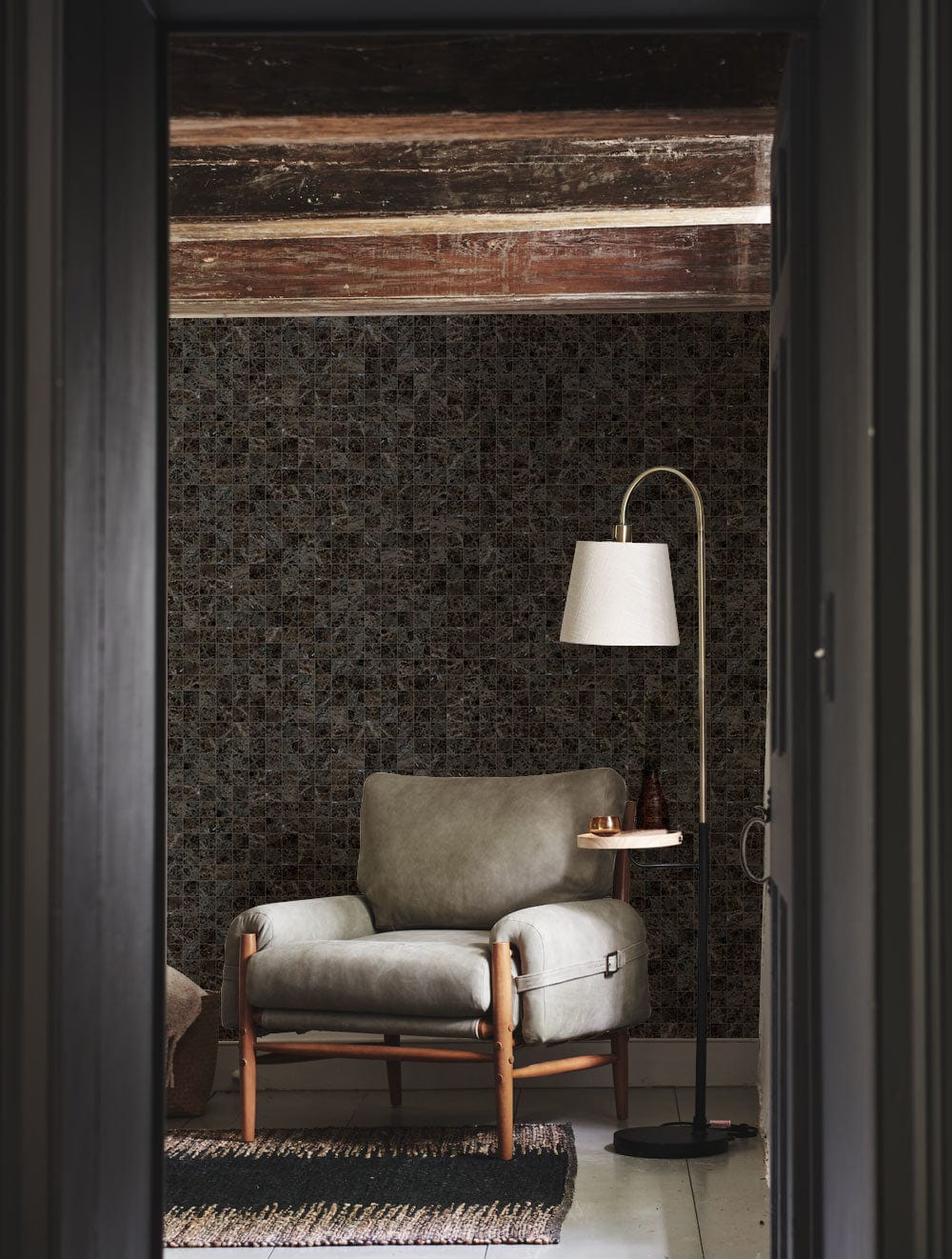 Hallway covered with a murky mosaic wallpaper mural
