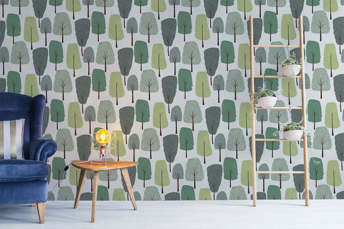 Whimsical Forest Green Tree Mural Wallpaper in living room