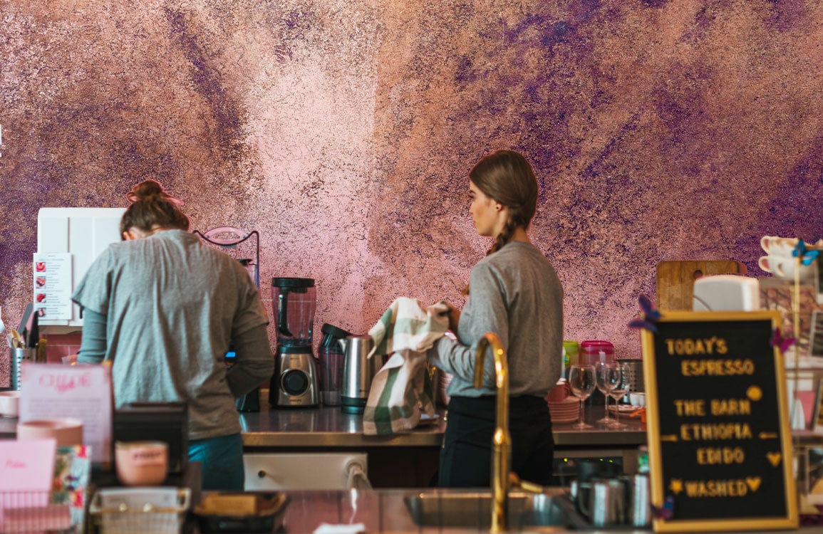 Abstract Watercolor Purple Hues Mural Wallpaper in restaurant setting