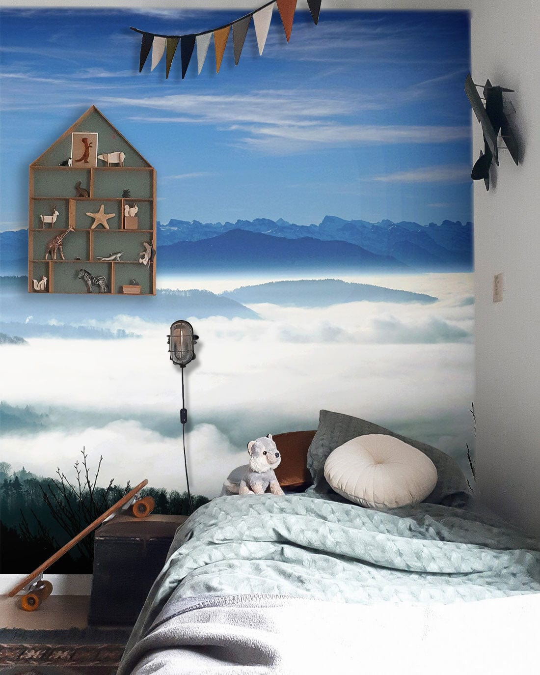 Wallpaper mural featuring a mountain landscape with clouds and sea for use in decorating a bedroom