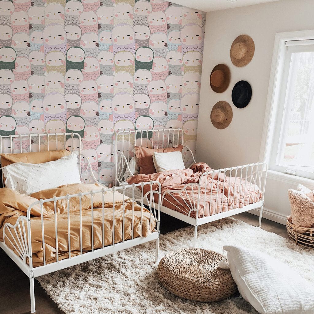 Wallpaper with a repeating owl babies pattern customized for a child's room