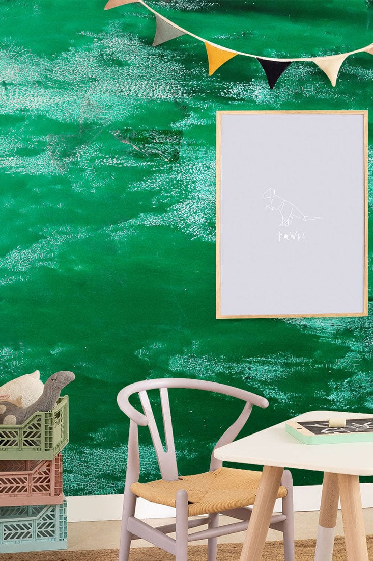 Wallpaper mural with an uneven green paint finish, ideal for use in nurseries.
