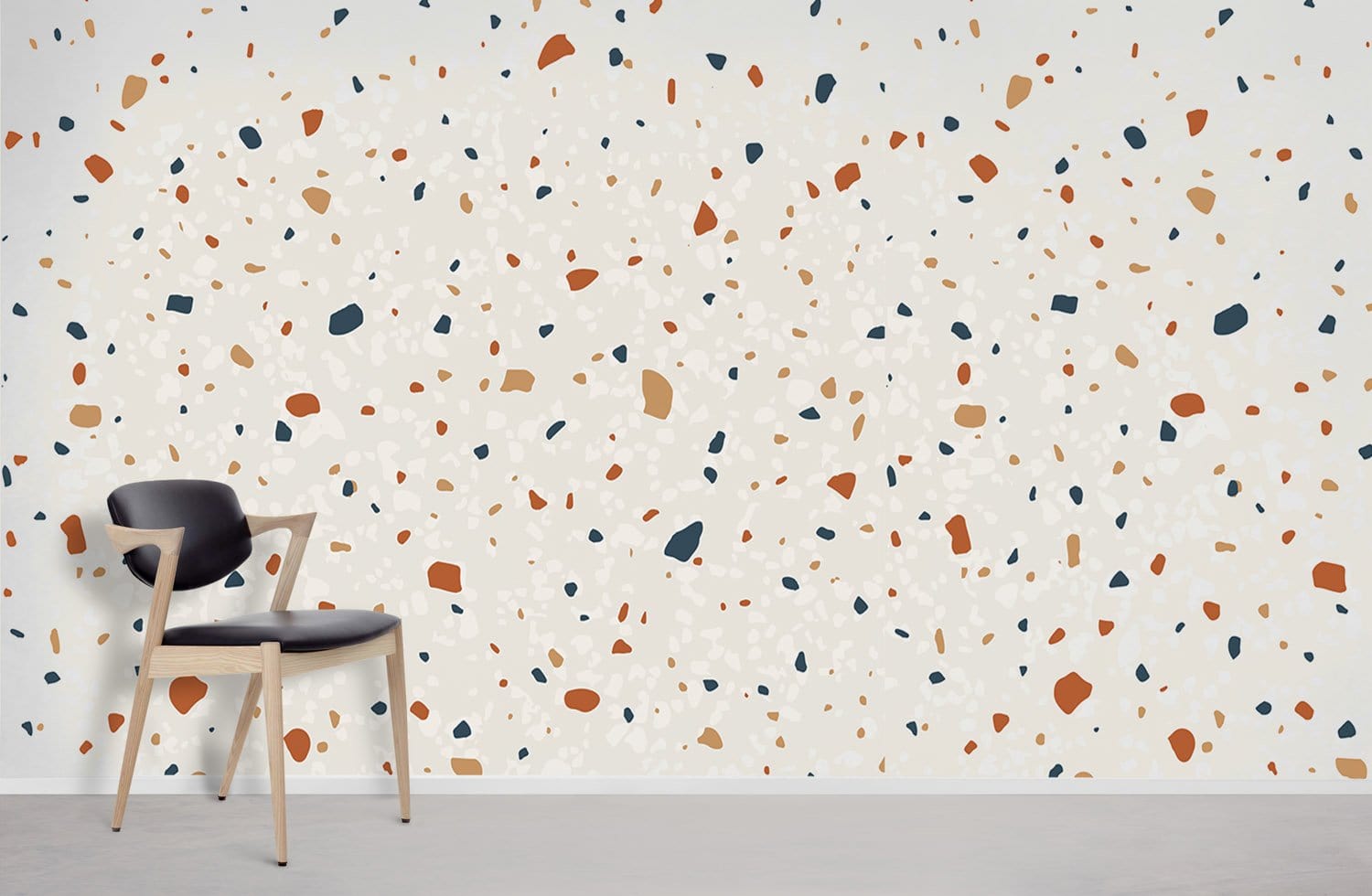 Terrazzo wallpaper with specks of pastel colour.