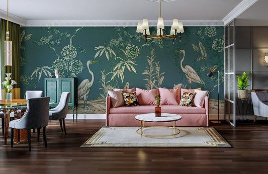 Elegant Green Heron Mural Wallpaper, pink sofa, dark wood flooring, stylish chandelier in modern living room.
