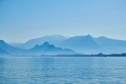 Wallpaper Mural with a Blue Lake and Mountains Scene for Home Decoration