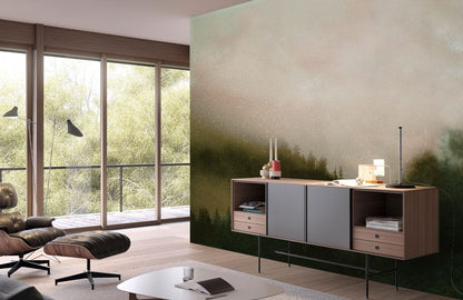 Modern lounge with Tranquil Misty Forest Wall Mural, mid-century armchair, wood flooring, large windows.