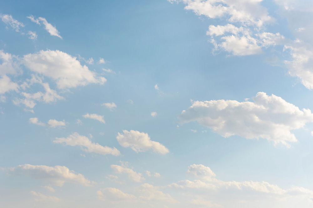 Floating Daylight Clouds Mural Wallpaper
