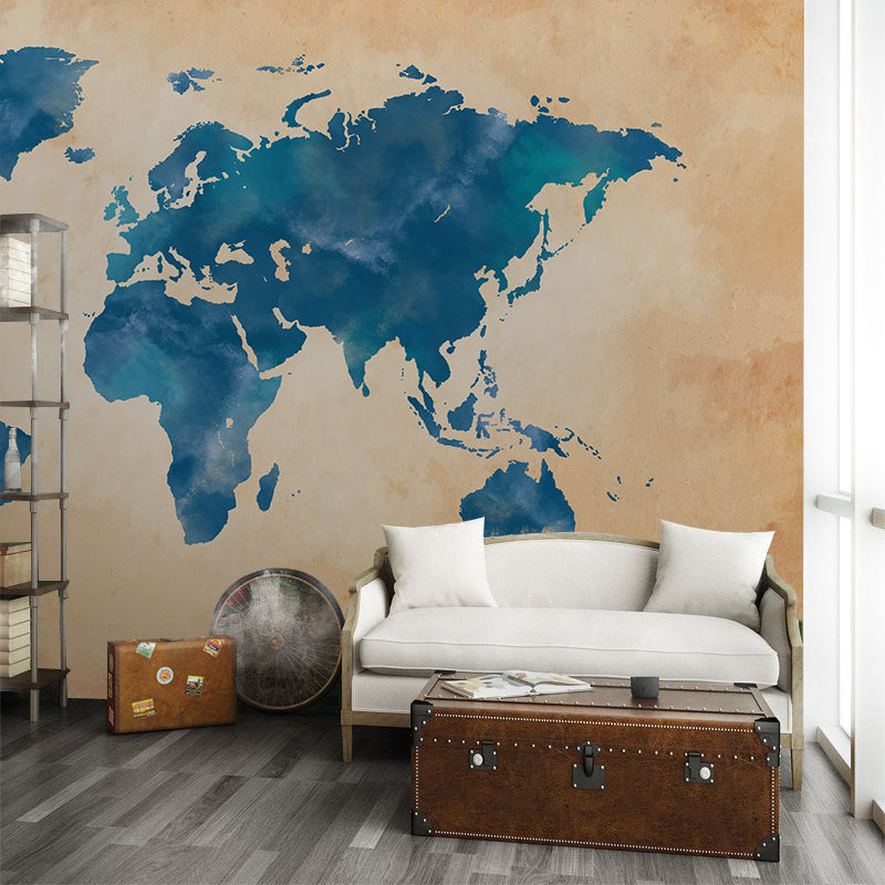 Vintage Blue Watercolor World Map Mural Wallpaper in living room