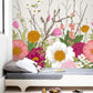 Wallpaper mural with colorful flowers blooming on the floor, perfect for decorating a bedroom