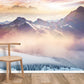 Sunset at the peak of the mountain with a snowy wallpaper mural in the background