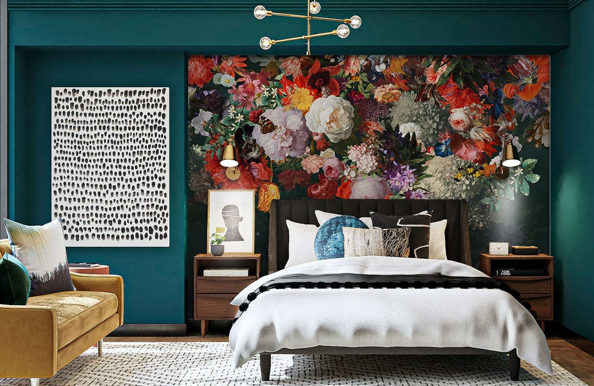 Luxurious dark floral mural wallpaper in bedroom with teal walls, vintage bed, mustard sofa, modern chandelier.