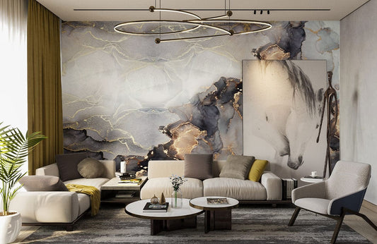 Luxurious modern living room features gold and grey marble effect wallpaper, plush grey sofas, abstract decor.
