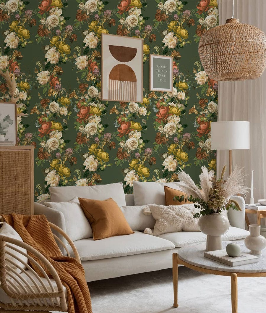 The living room's decor is a green bouquet of vines on a wall mural