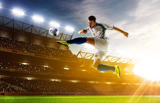 Vibrant Stadium Soccer Player Mural Wallpaper