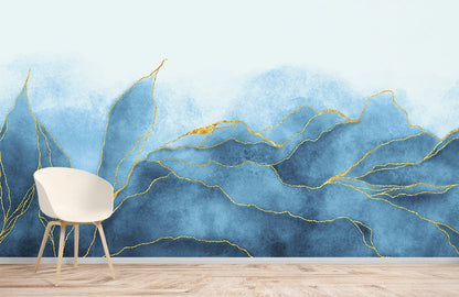 Wallpaper mural for home decoration with a blue watercolour painting with golden lines.