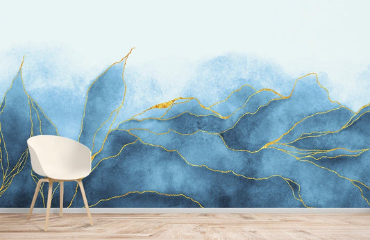 Wallpaper mural for home decoration with a blue watercolour painting with golden lines.