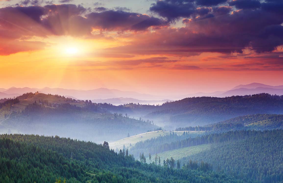 Papier Peint Panoramique Coucher de Soleil sur Montagne