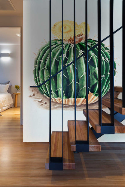Hallway adorned with a wallpaper mural of Parodia Sellowii.