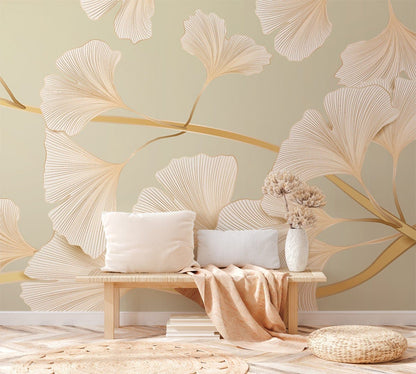 Elegant beige ginkgo leaf wallpaper, wooden bench with cushions, woven rug, vase, minimalist decor.