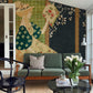 A young woman seated amongst flowering plants serves as a decorative element in the living room.