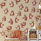 A picture of a sloth on brown wallpaper, suitable for use as nursery d��cor