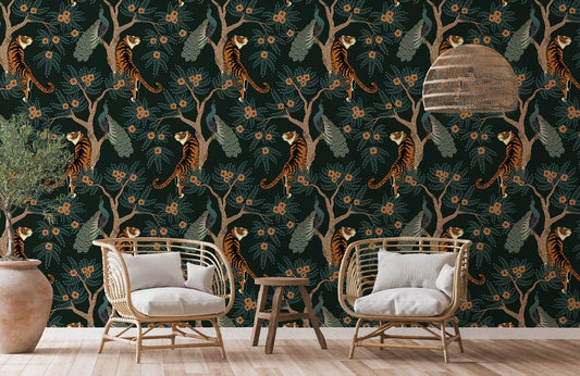 Elegant dark green wildlife wallpaper enhances exotic interior with wicker chairs and light wood flooring.