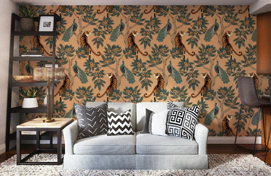 Tropical tiger and peacock mural wallpaper with grey sofa, patterned cushions, dark shelf, cosy living room.