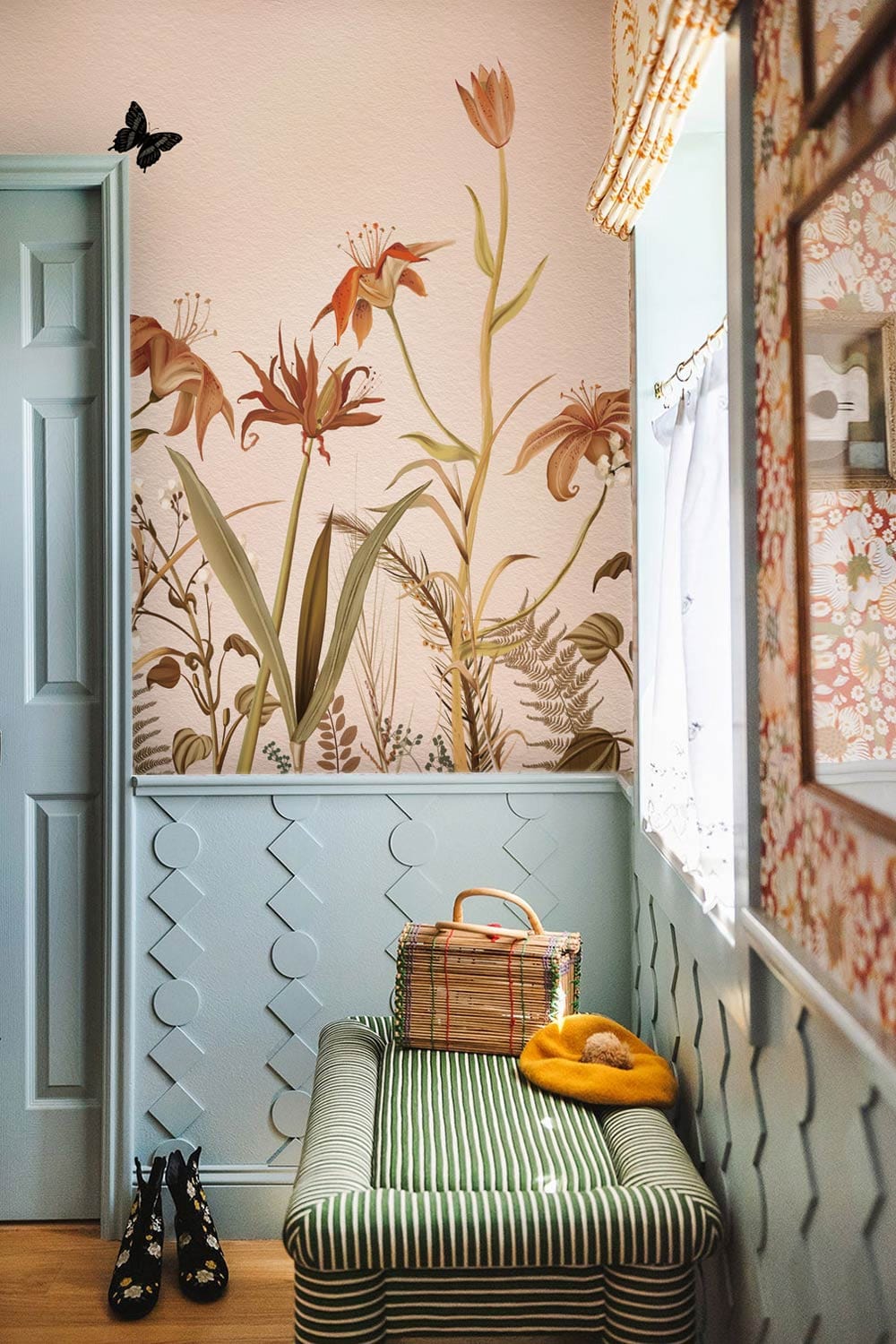 wallpaper with a floral and butterfly motif for the hallway