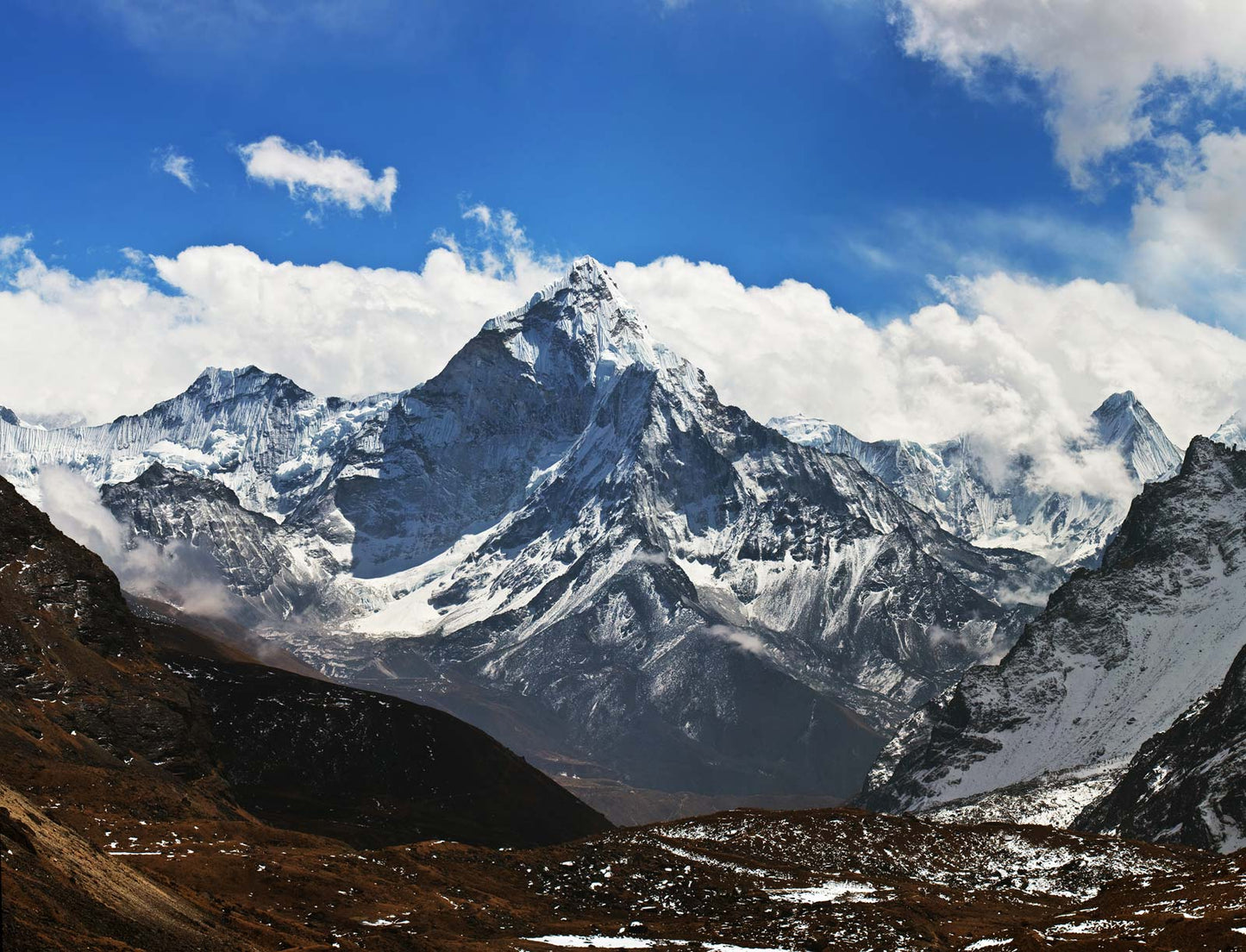 Wallpaper mural for interior design with a snowy landscape of a valley