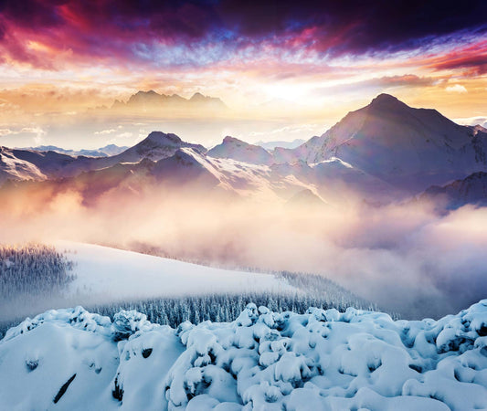 Wallpaper mural depicting an evening sunset above the mountain after snowfall.