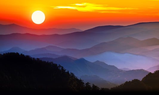 Papier Peint Panoramique Coucher de Soleil sur les Montagnes