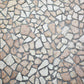 Wallpaper mural of twinkling stones and mixed bricks in the room.