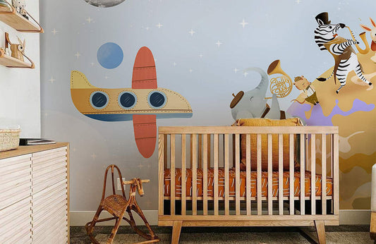 Wallpaper mural with roaming animals from the universe for the nursery.