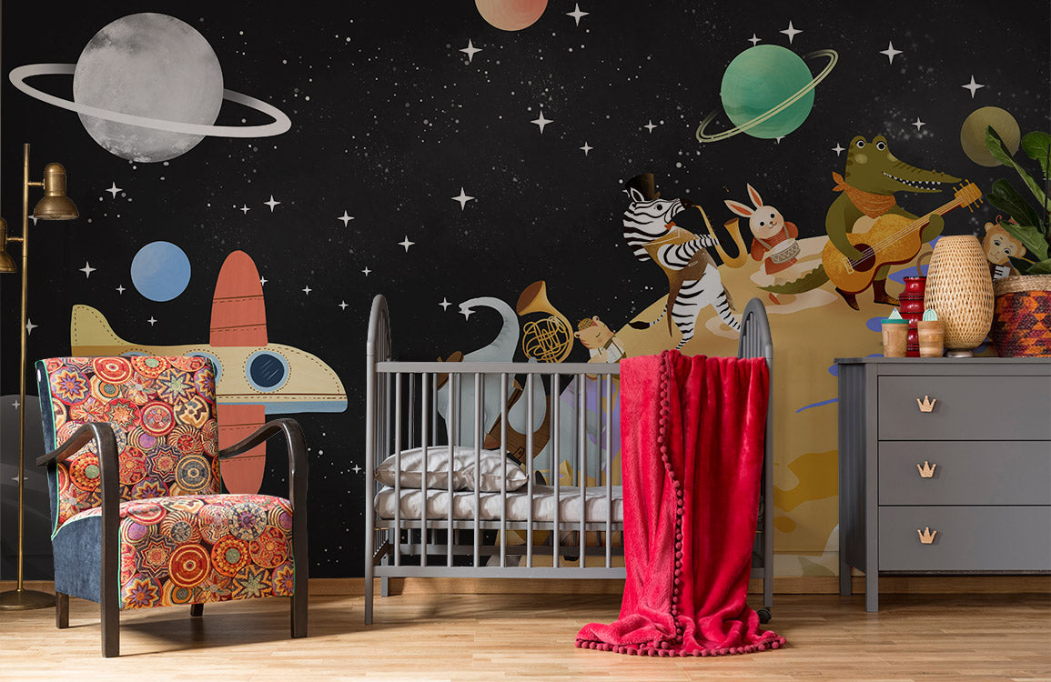 Wallpaper mural with roaming animals from the universe for the nursery.