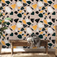 Wallpaper mural for home decoration featuring a terrazzo and marble texture.