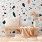Mural wallpaper with a colourful dot and marble pattern in the room