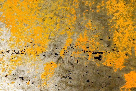 Wallpaper mural featuring an aged yellow paint finish, perfect for decorating a room.