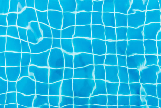 Wallpaper mural featuring a clear swimming pool, perfect for decorating your home.