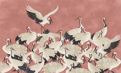 Wall mural with cranes on a pink background, perfect for home decorating